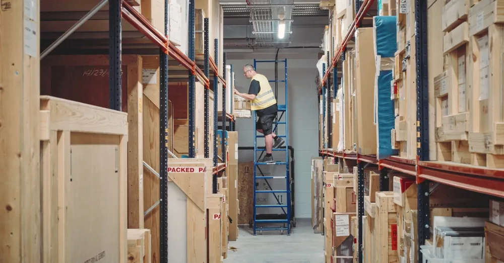 Fine-art warehouse racking with crates, before